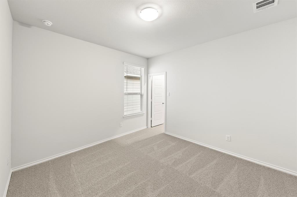 1708 Potomac Lane Blue Ridge, TX 75424 - Photo 9 of 27 an empty room with windows