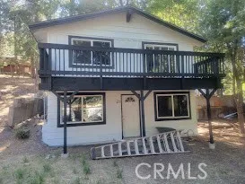 a front view of a house with balcony