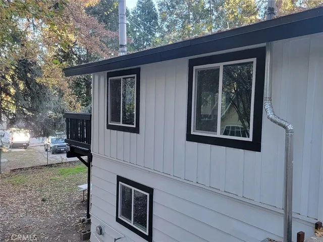 a backyard of a house with seating space