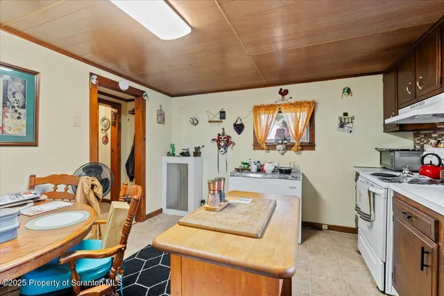 a bedroom with a bed and a table