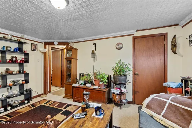 a kitchen with a refrigerator and a sink
