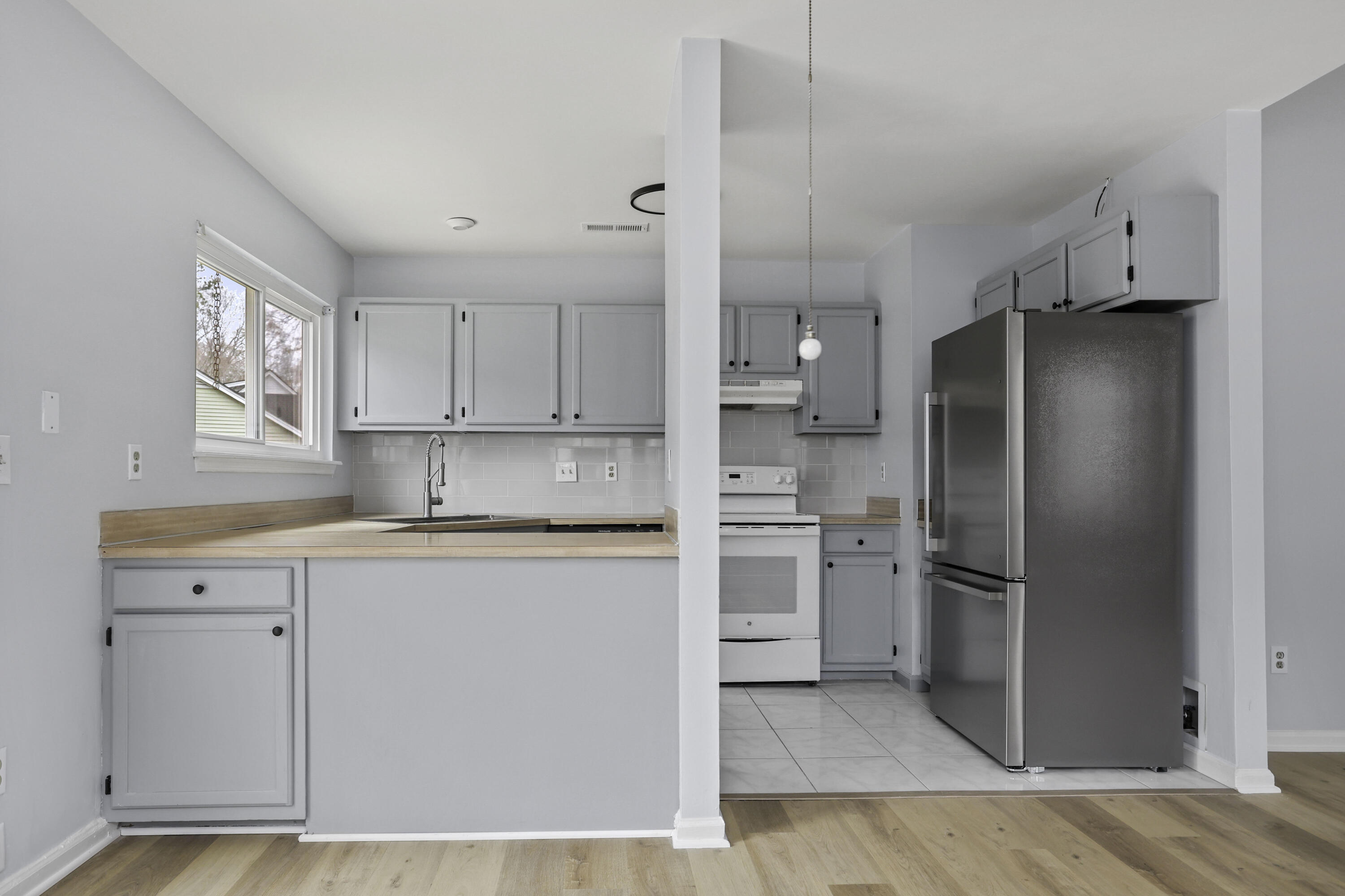309 Commons Way Goose Creek, SC 29445 - Photo 11 of 29 309CommonsWayKitchen-CasaVerdemediaLLC2