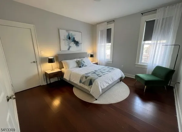 a bed room with a bed furniture and a window