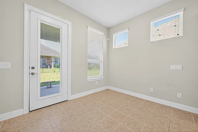 an empty room with windows