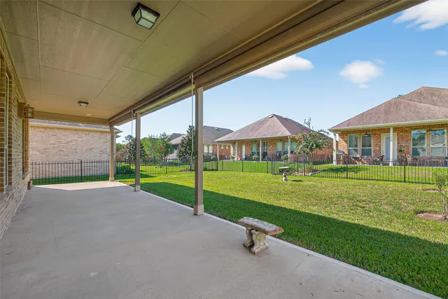 a view of an house with backyard porch and outdoor space
