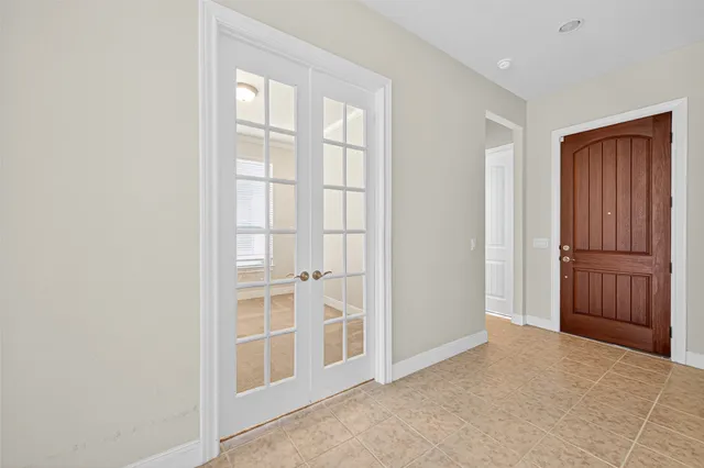 an empty room with windows