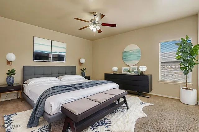 a bathroom with a granite countertop sink a toilet a mirror a vanity and shower