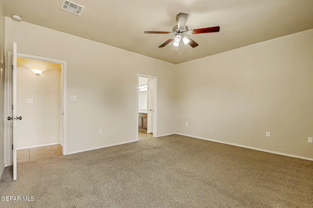 a bathroom with a sink double vanity and a mirror