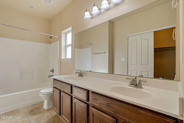 a view of a room with shelf on the wall