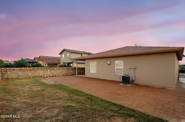 an aerial view of residential house with outdoor space