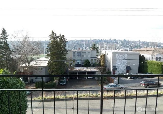 a view of a lake from a balcony