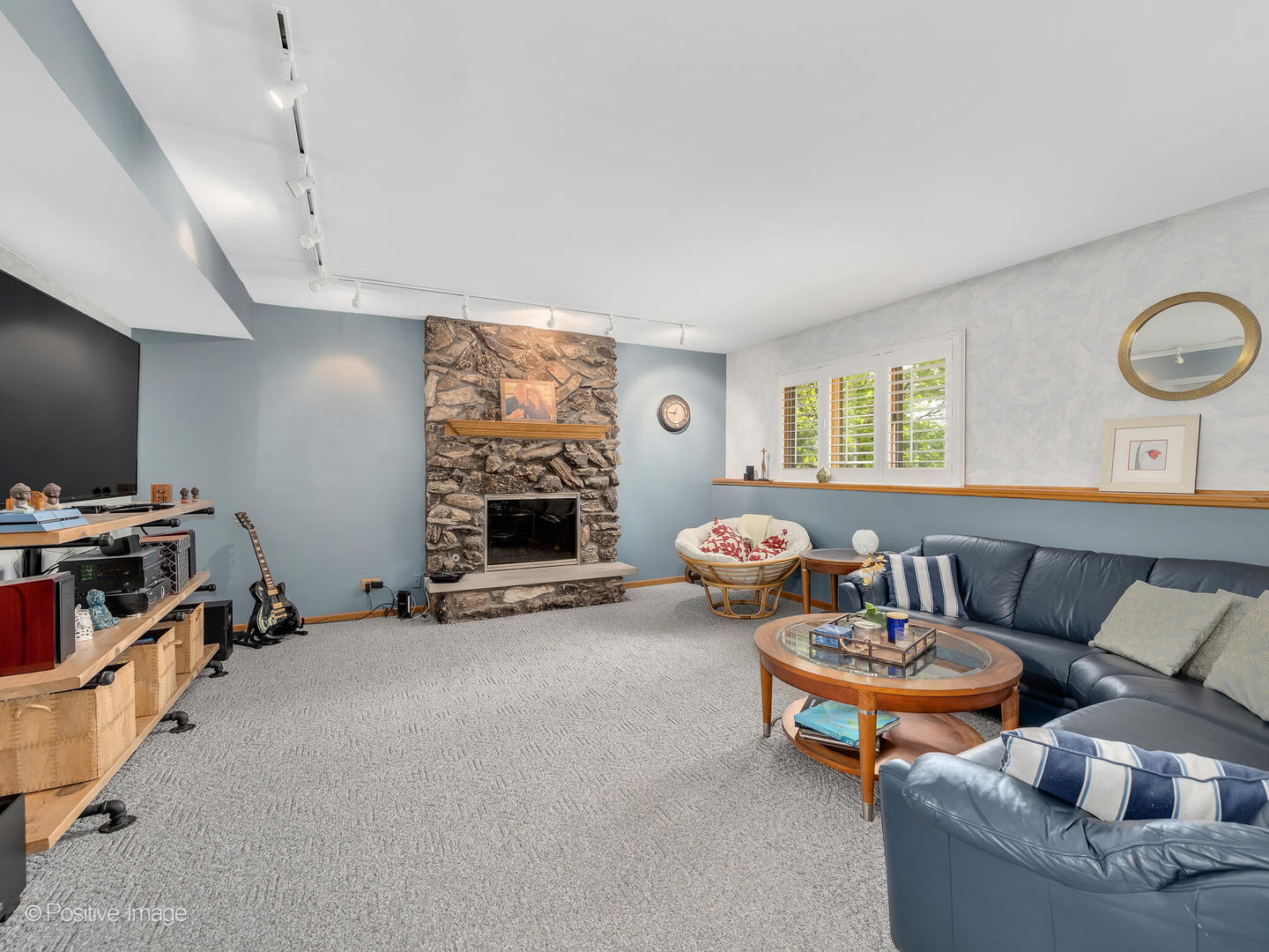 516 Camdon Circle Bartlett, IL 60103 - Photo 12 of 34 a living room with furniture and a flat screen tv