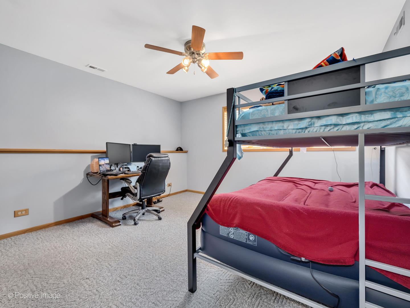 516 Camdon Circle Bartlett, IL 60103 - Photo 17 of 34 a bed room with a bed and a chair