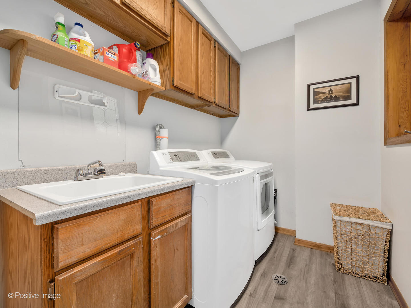 516 Camdon Circle Bartlett, IL 60103 - Photo 18 of 34 a utility room with dryer and washer