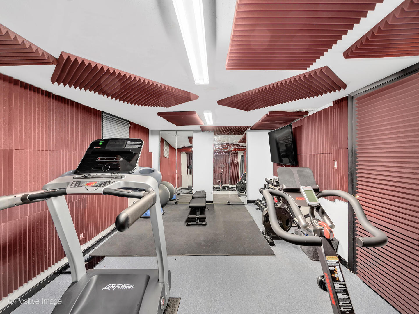 516 Camdon Circle Bartlett, IL 60103 - Photo 23 of 34 a view of a room with gym equipment