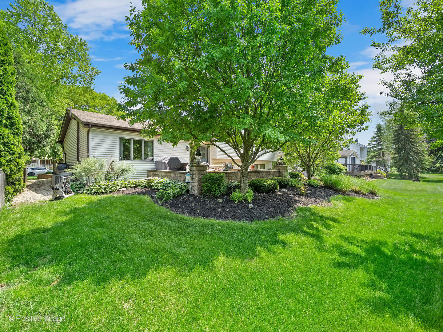 516 Camdon Circle Bartlett, IL 60103 - Photo 28 of 34 a front view of house with yard and green space