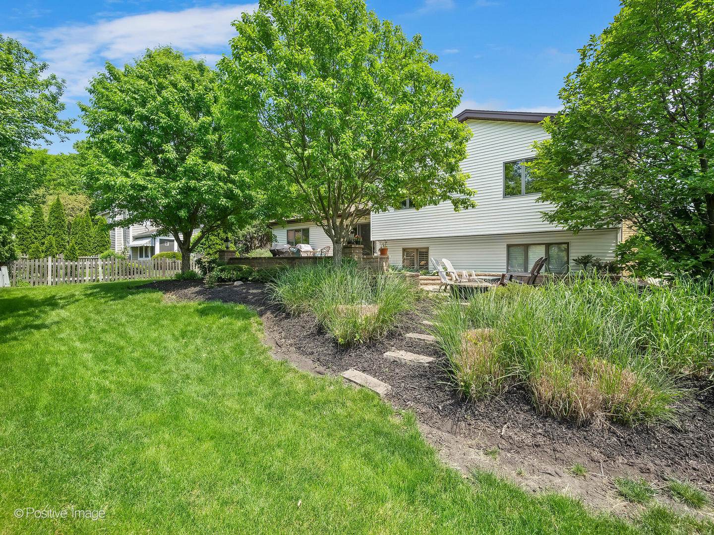 516 Camdon Circle Bartlett, IL 60103 - Photo 29 of 34 a view of a house with a yard and plants