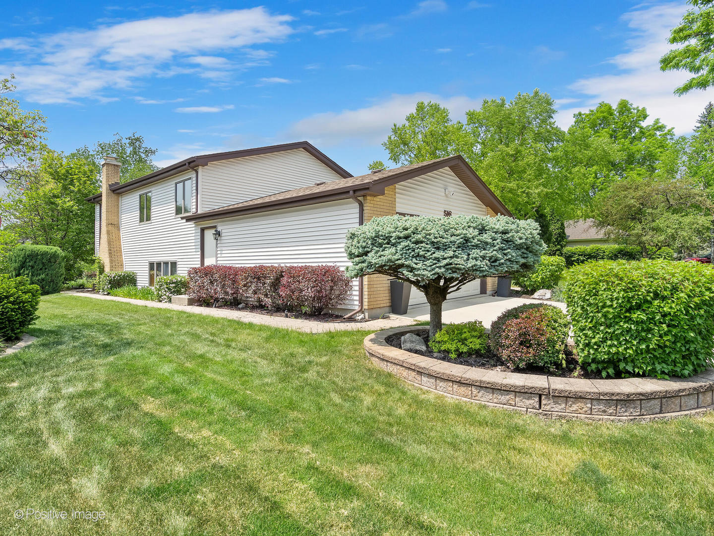 516 Camdon Circle Bartlett, IL 60103 - Photo 30 of 34 a front view of a house with a yard