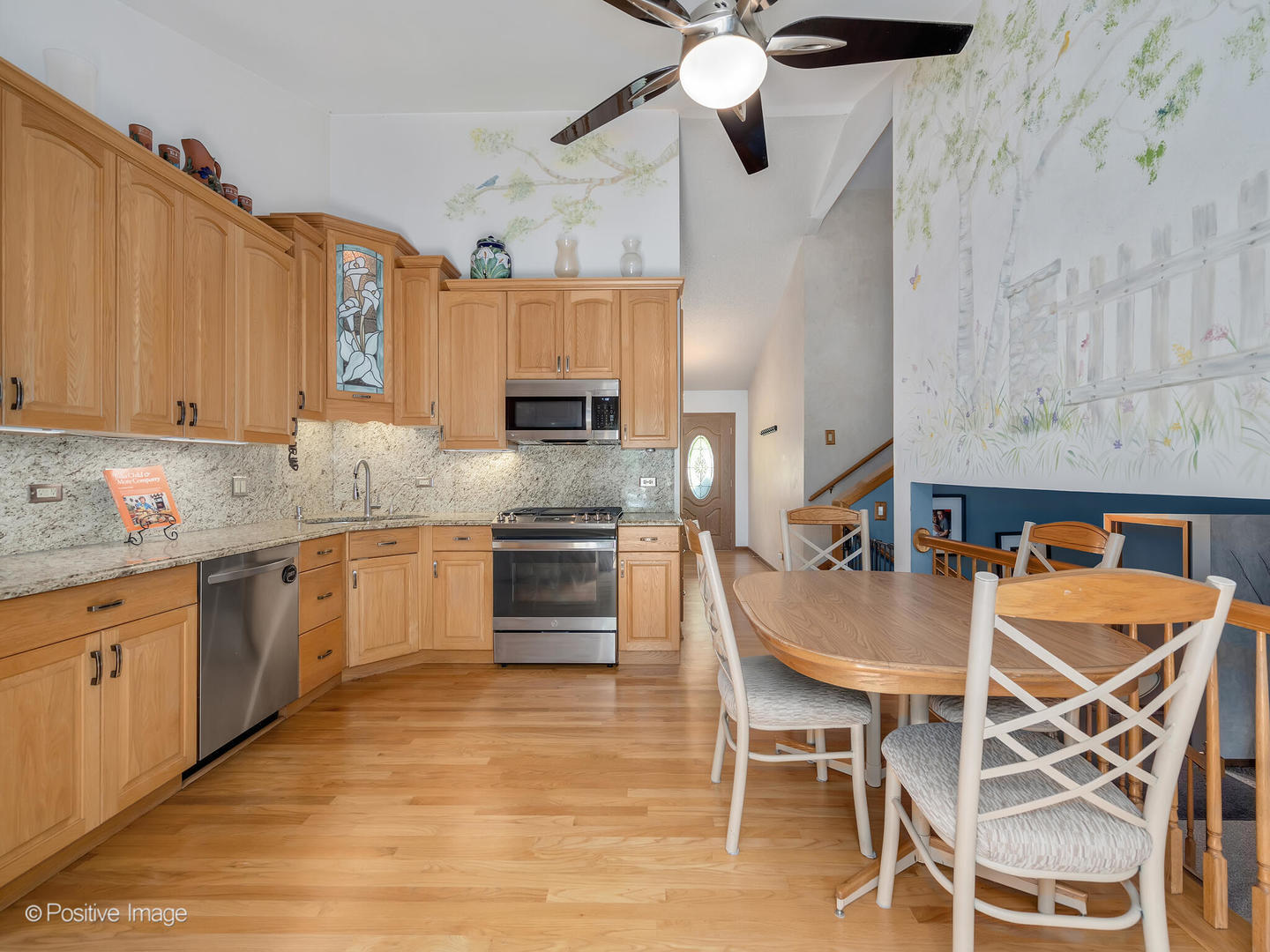 516 Camdon Circle Bartlett, IL 60103 - Photo 9 of 34 a kitchen with cabinets a sink and appliances