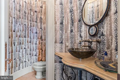 a bedroom with a large bed and a large window