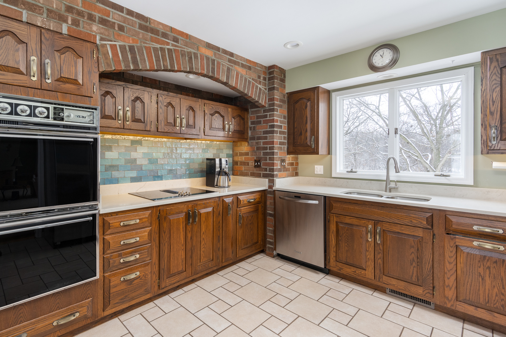 3 Spring Creek Drive Spring Valley, IL 61362 - Photo 15 of 29 a kitchen with stainless steel appliances granite countertop a sink and cabinets