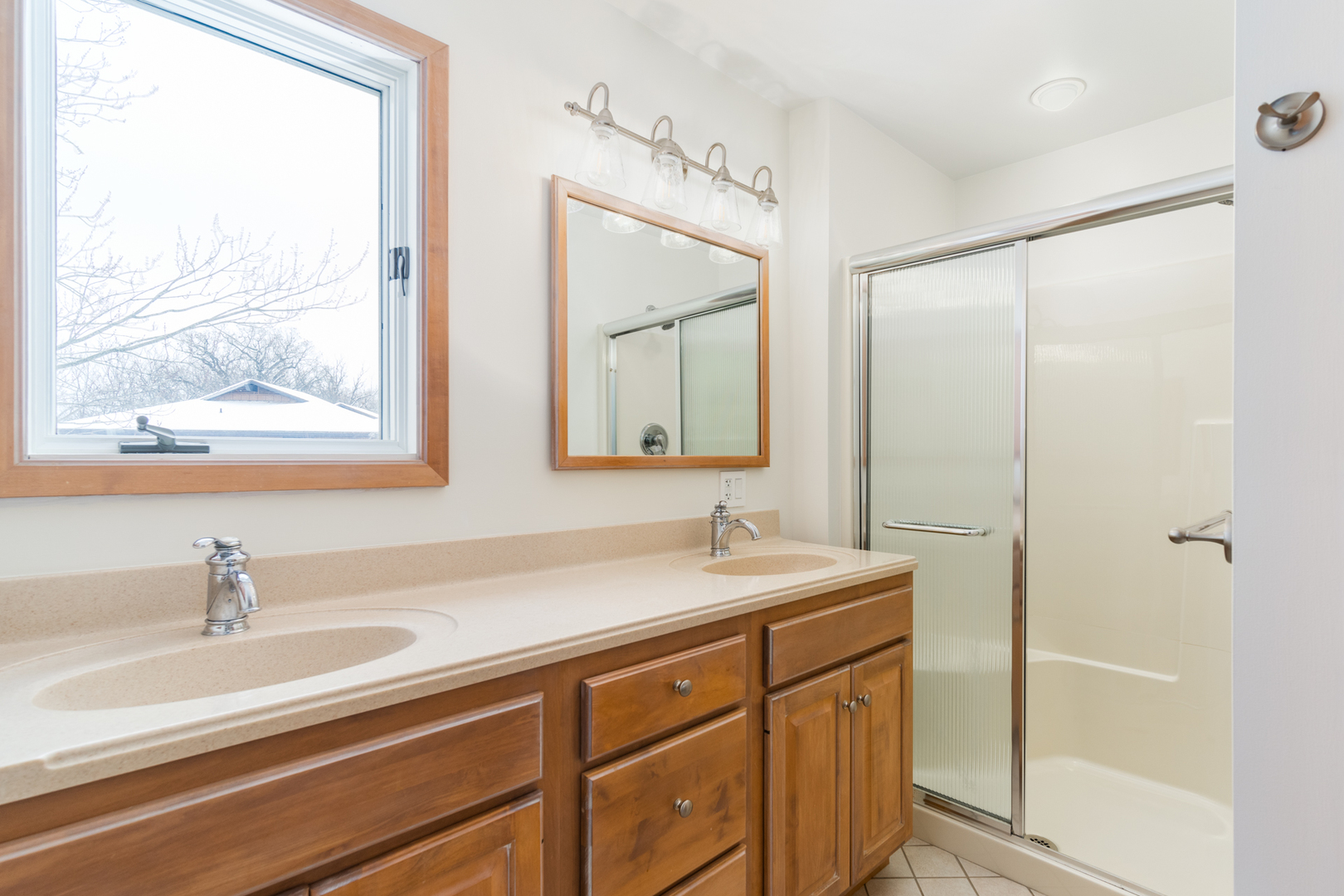 3 Spring Creek Drive Spring Valley, IL 61362 - Photo 20 of 29 a bathroom with a double vanity sink mirror and