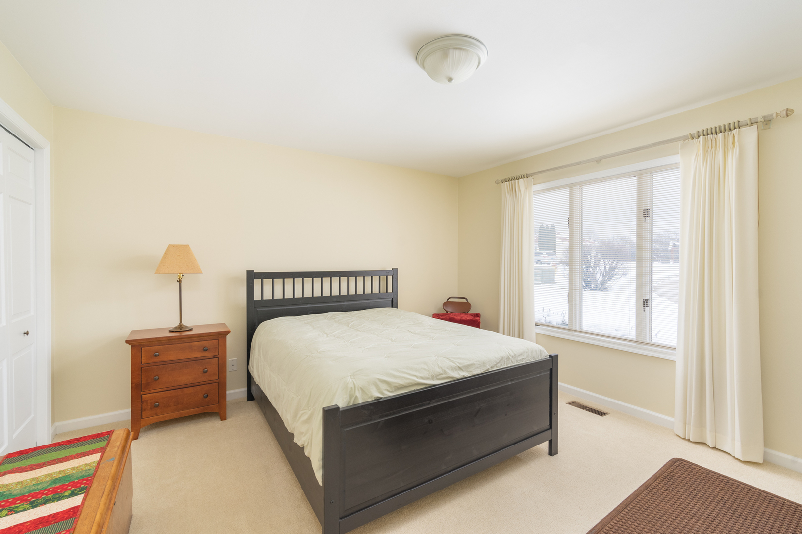 3 Spring Creek Drive Spring Valley, IL 61362 - Photo 21 of 29 a large bed sitting in a bedroom next to a window