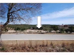 a view of a yard and ocean