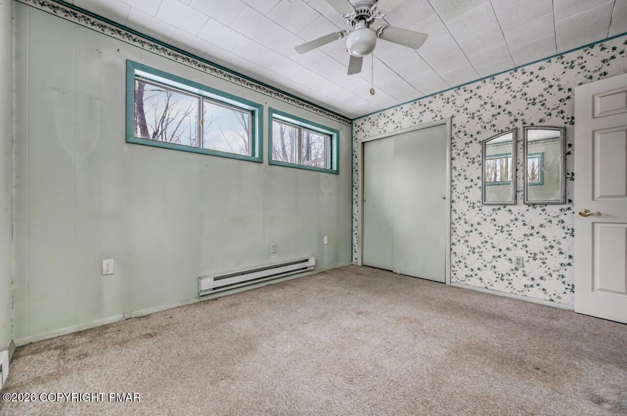 1912 Johns Road Effort, PA 18330 - Photo 32 of 44 an empty room with windows