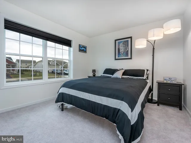 an empty room with bookshelf