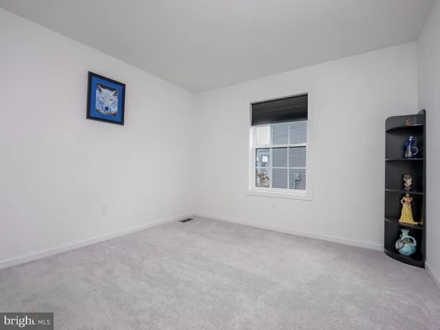 a bathroom with a washer and dryer