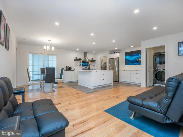 a kitchen with a refrigerator and a microwave