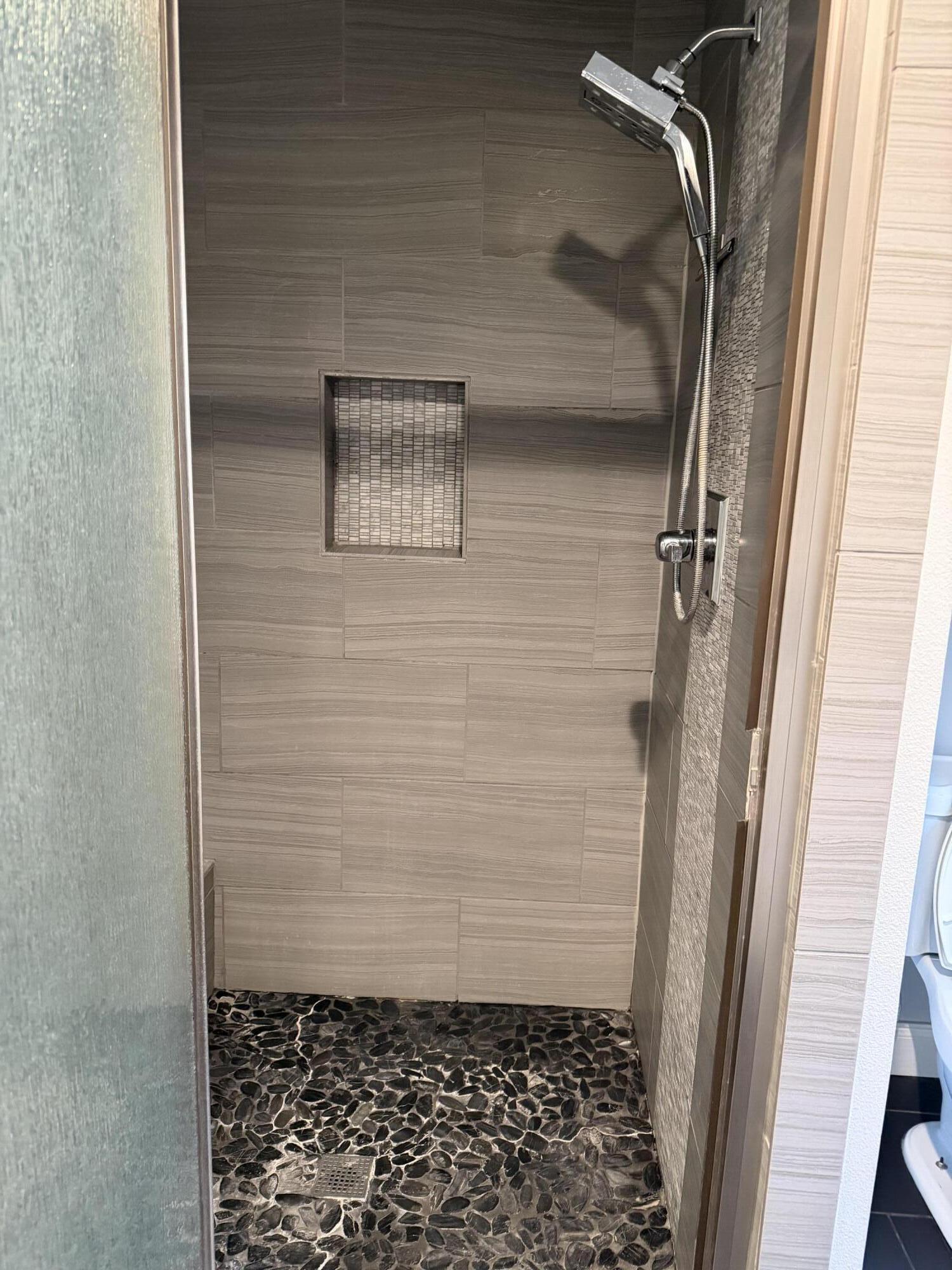 3110 22nd Street Lubbock, TX 79410 - Photo 14 of 22 a bathroom with a shower