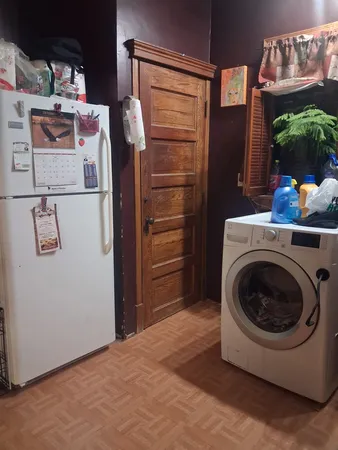 a room with lots of clutter and furniture