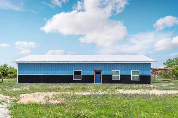 a front view of house with yard