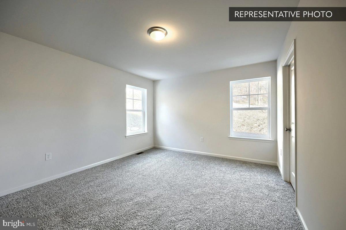 Sugar Maple Plan At Hills Spring Grove, PA 17362 - Photo 23 of 34 a view of an empty room with a window