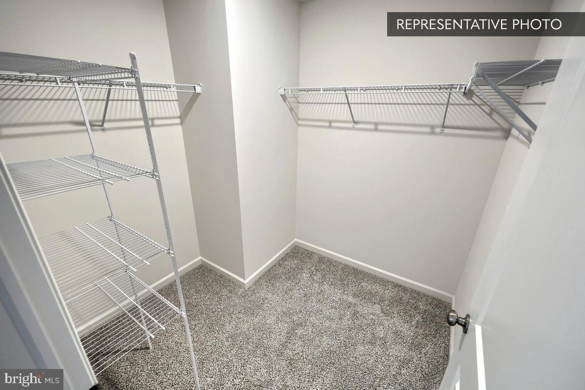 Sugar Maple Plan At Hills Spring Grove, PA 17362 - Photo 28 of 34 a view of a room with racks on the wall