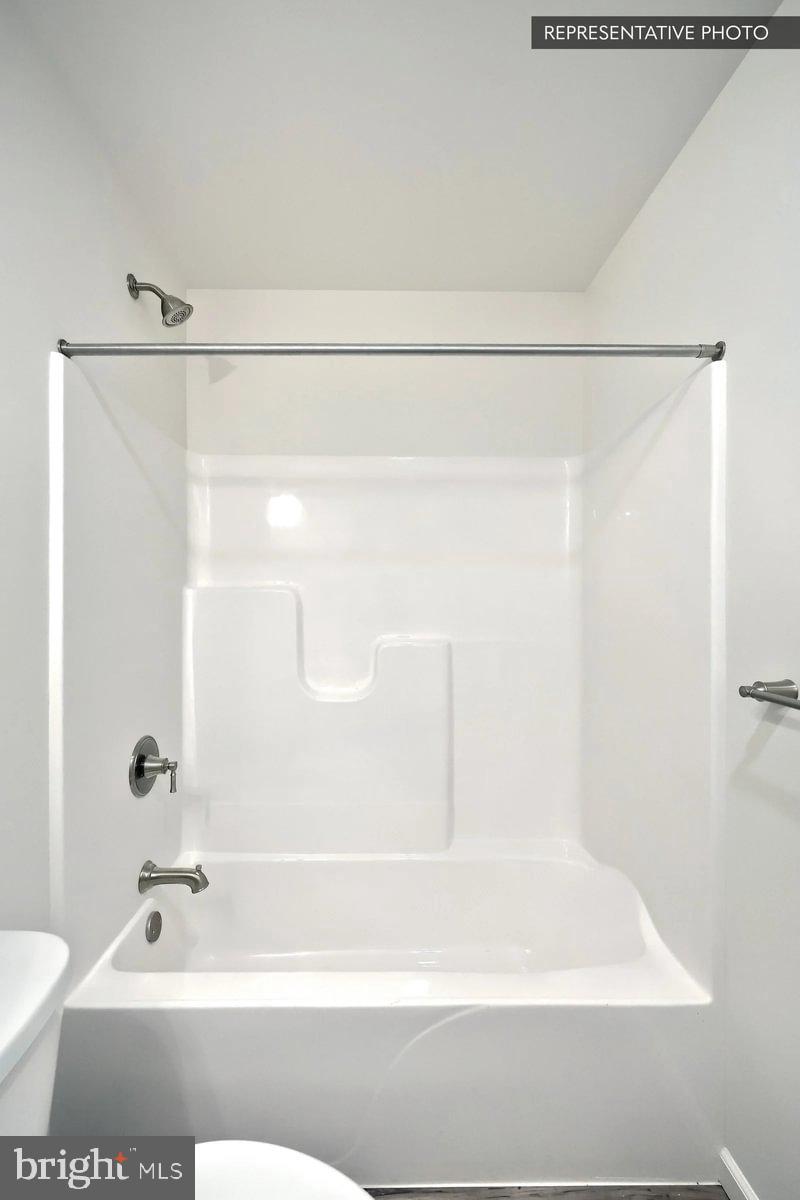 Sugar Maple Plan At Hills Spring Grove, PA 17362 - Photo 31 of 34 a bathroom with a shower and a bathtub