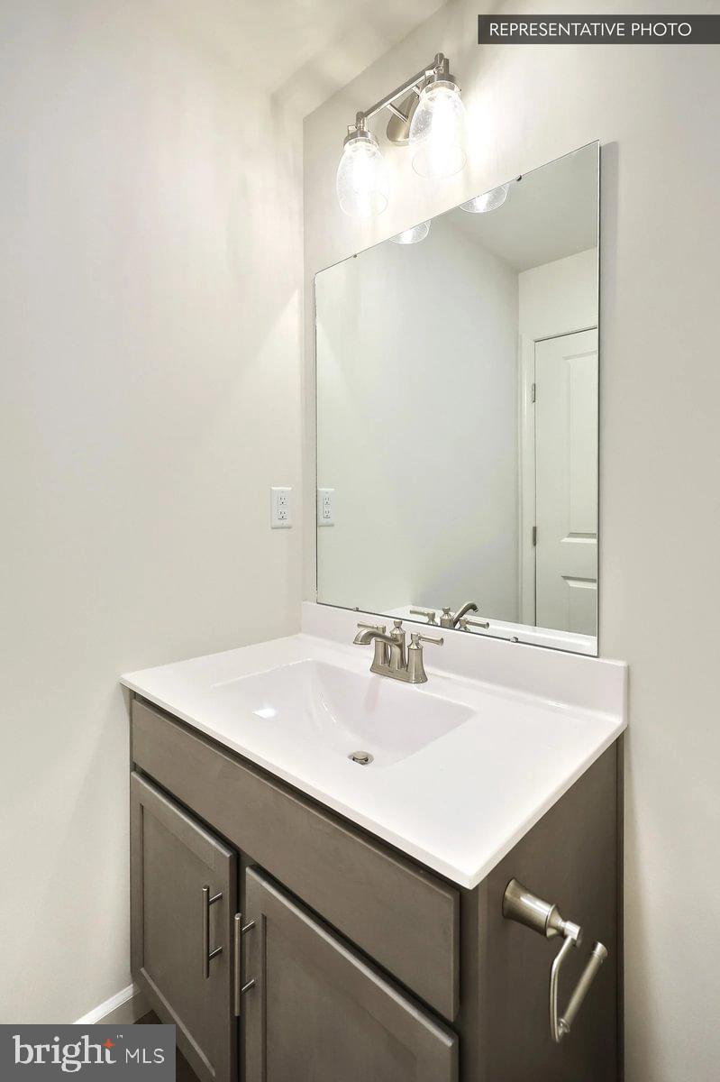 Sugar Maple Plan At Hills Spring Grove, PA 17362 - Photo 32 of 34 a bathroom with a sink and a mirror
