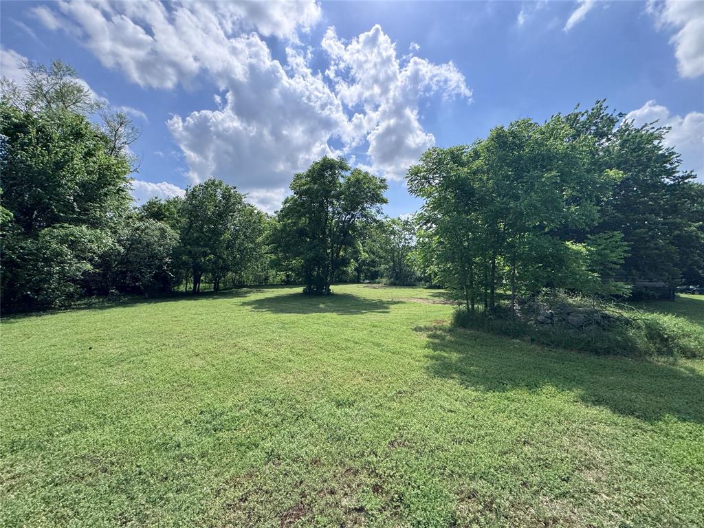 806 Old Base Road Aurora, TX 76078 - Photo 17 of 23 a view of outdoor space with deck and yard