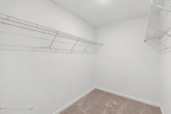 a view of a room with racks on the wall