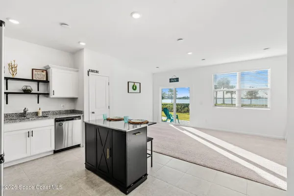 a kitchen with a stove and a sink