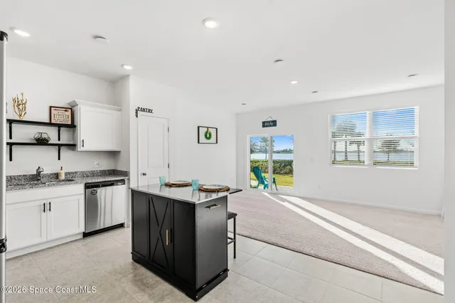a kitchen with a stove and a sink