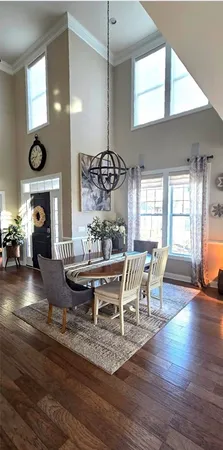a living room with furniture fireplace and a flat screen tv
