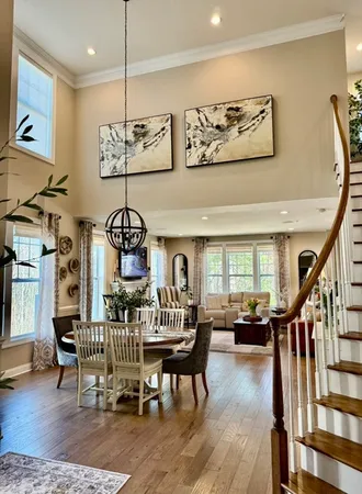 a view of staircase with lots of frames and stairs