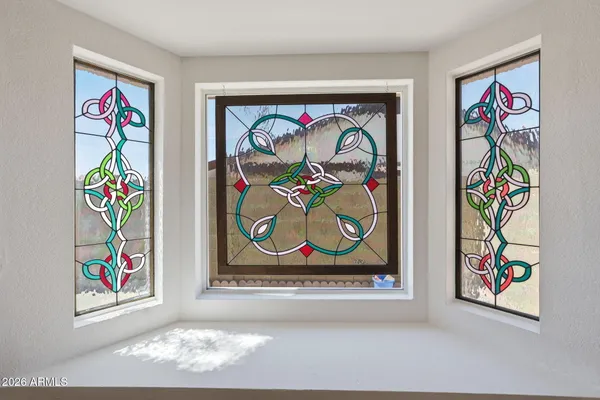 a kitchen with stainless steel appliances a stove microwave and refrigerator