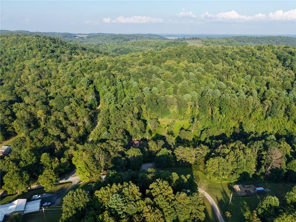 0 North Loop Road Dayton, PA 16222 - Photo 18 of 50 a view of a lake with a building