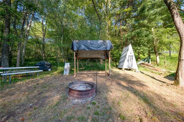 a view of outdoor space with wooden floor and entrance