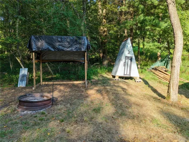 a view of backyard with green space