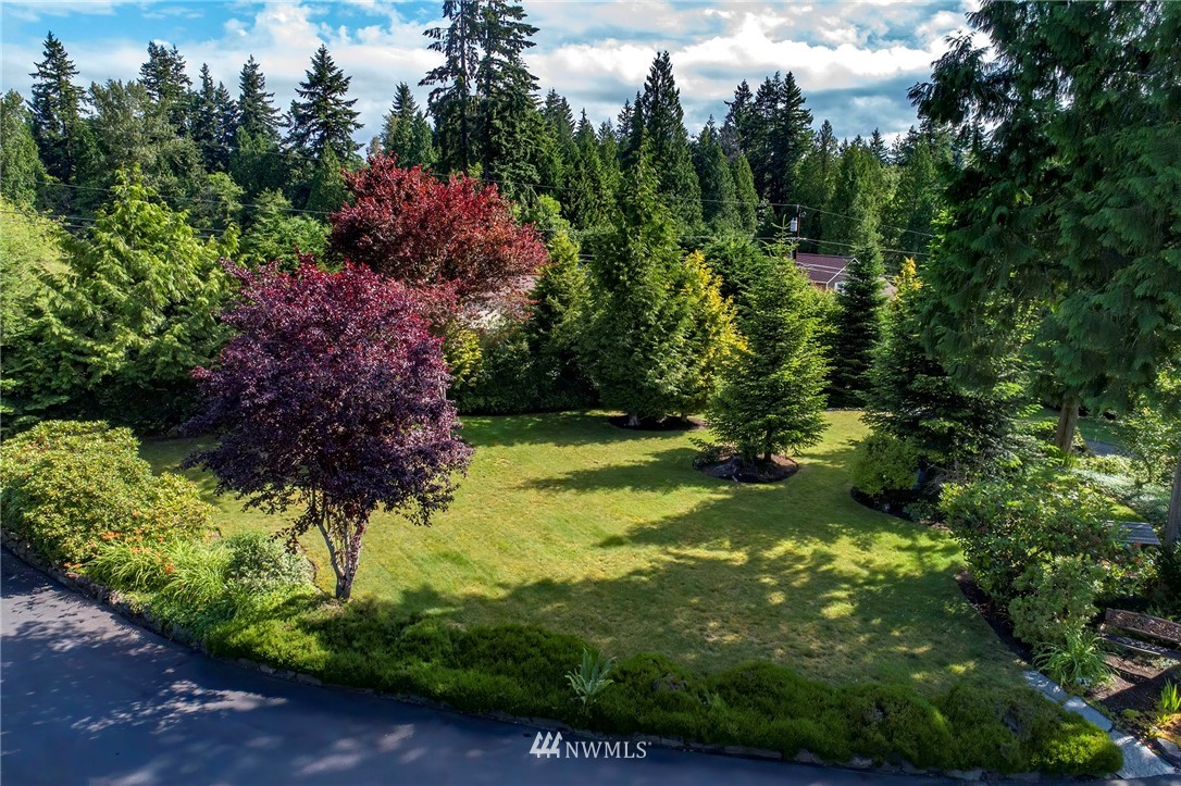 4826 200th Street Southeast Bothell, WA 98012 - Photo 7 of 40 a view of a garden with plants